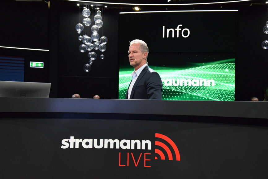 Marco Gadola, CEO of Straumann speaking at the company's press conference. (Photograph: Michelle Hodas, DTI) 