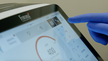 Root canal irrigation using a laser