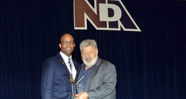 Steven W. Kess receives special recognition award from the National Dental Association