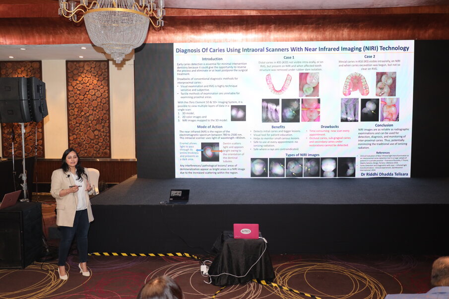 Delegates and students presenting posters