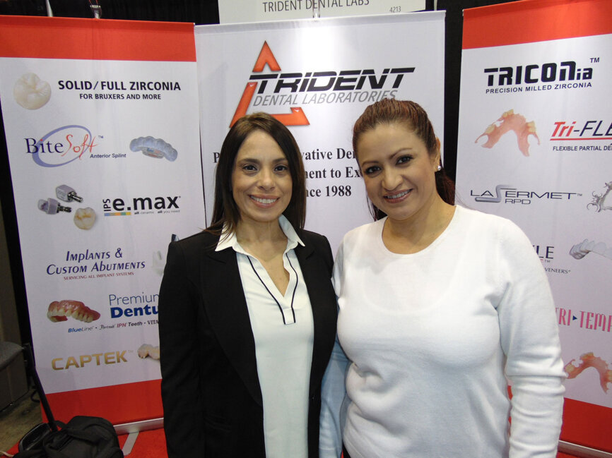 Nory Candelario, left, and Eva Hernandez of Trident Dental Laboratories. (Photo: Fred Michmershuizen/Dental Tribune America) 