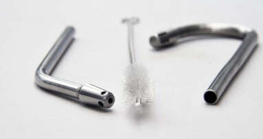 Dental students design metal saliva ejectors