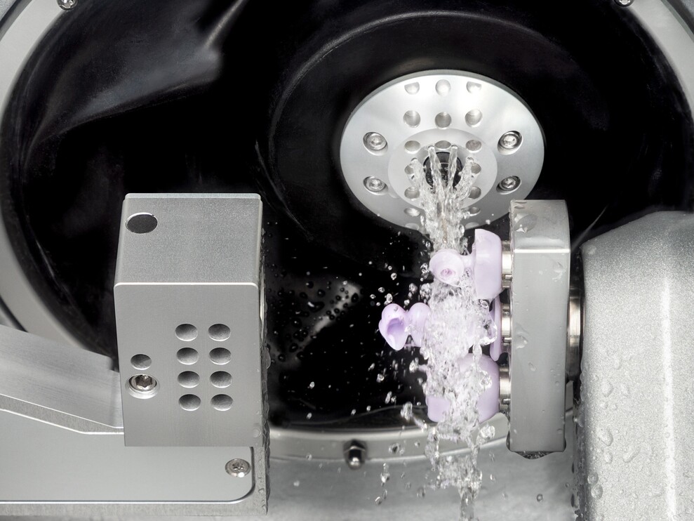 Wet grinding of glass-ceramic restorations in the milling unit.