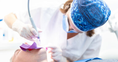 Laser-assisted irrigation in endodontic treatment of a tooth with obstructed canals—A case report