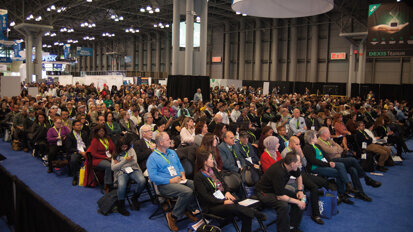 The Live Dentistry Arena is filled with attendees on the show floor of the 2018 Greater New York Dental Meeting. (Photo: Jahmel Charles, Dental Tribune America)