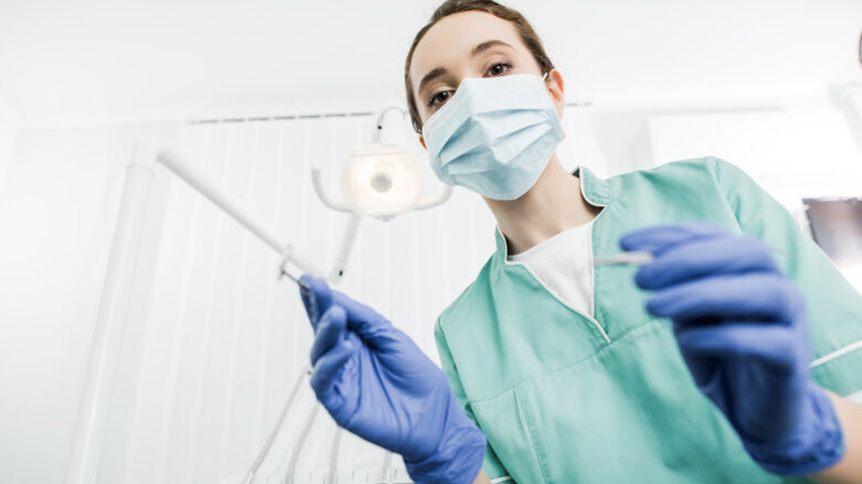 Dental biofilm of symptomatic COVID‐19 patients harbours SARS‐CoV‐2