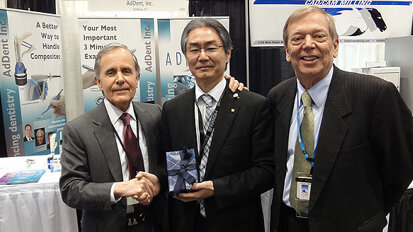 AdDent presents award to J. Morita AdDent presents award to J. Morita