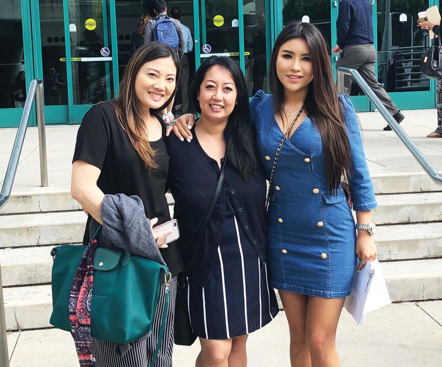 AAO attendees get ready to enter the Los Angeles Convention Center for the AAO meeting.