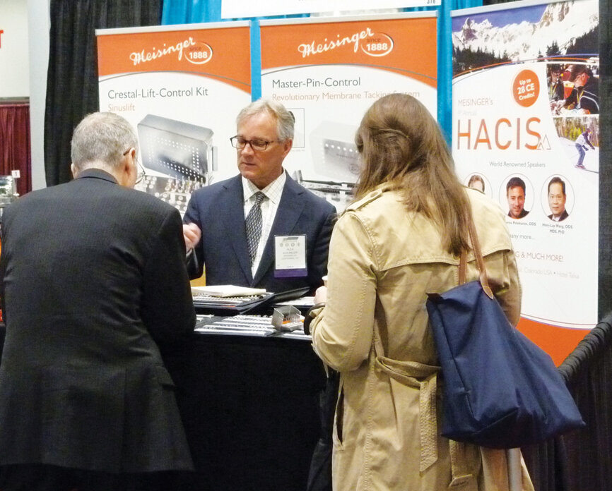 Meisinger USA President Alex Miller talks with attendees. (Photo: Sierra Rendon/DTA)