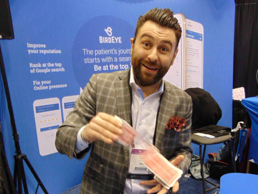 Magician Nick Roy shuffles the deck at Birdeye. (Photo: Fred Michmershuizen/Dental Tribune America)