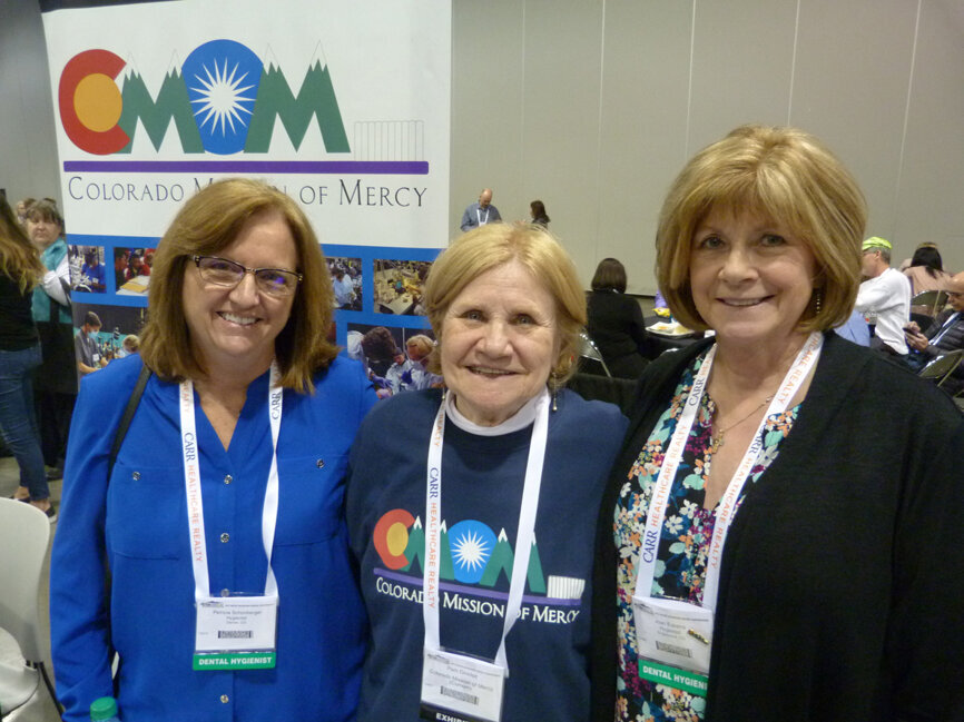 In the Colorado Mission of Mercy booth, from left, Department Lead Patricia Schonberger, RDH, Executive Director Pam Kinkfelt and Department Lead Joan Eskens, RDH. (Photo: Robert Selleck/Dental Tribune America)