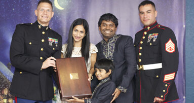 Dental office joins U.S. Marines in war against poverty and illiteracy