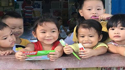 Henry Schein Cares donates toothbrushes and toothpaste to children living in Vietnamese orphanage