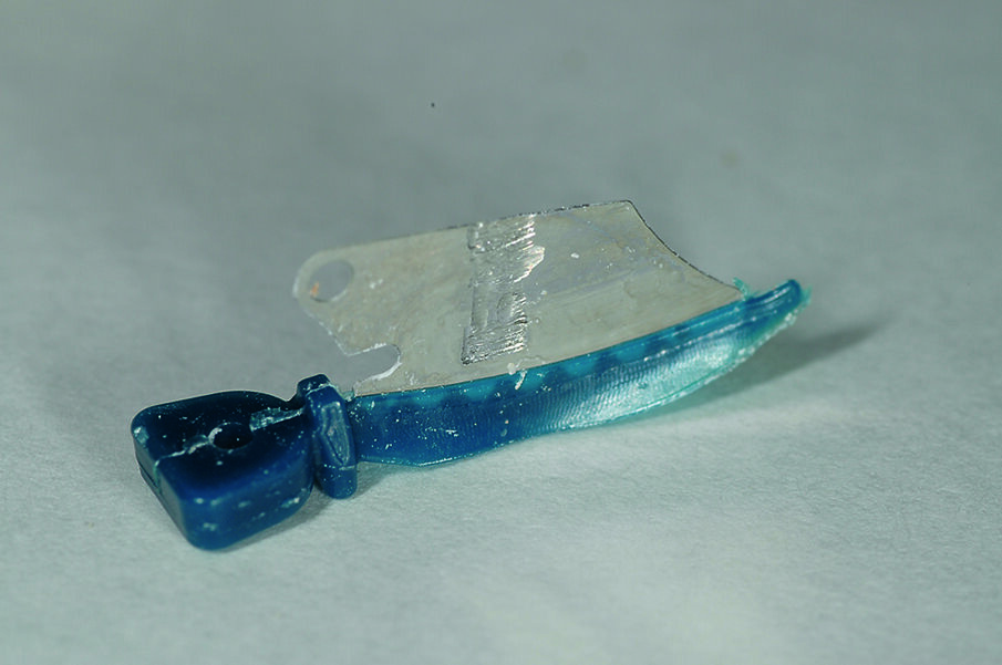 Palodent® V3 WedgeGuard showing damage caused to the WedgeGuard (and not the adjacent tooth) after tooth preparation.