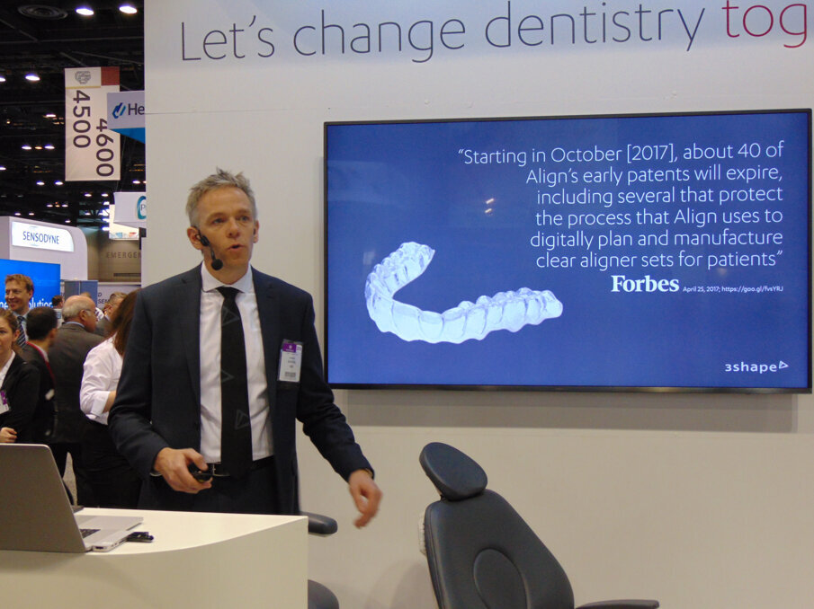 Allan Hyldal of 3Shape talks about some of the company’s latest offerings during a press conference on the show floor. (Photo: Fred Michmershuizen/Dental Tribune America)