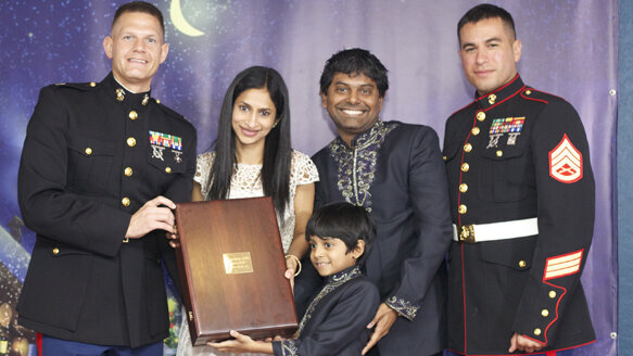 Dental office joins U.S. Marines in war against poverty and illiteracy