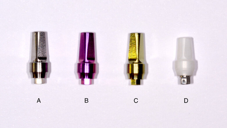 Influence of abutment material and detersion protocol on bacterial adhesion: An in vitro study