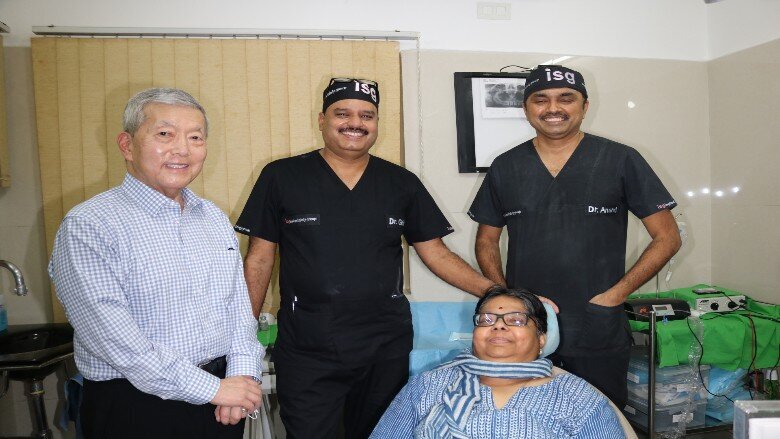 Trefoil surgical team with the patient