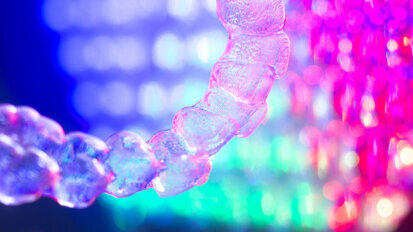 Scientists analyse bacteria on clear aligners