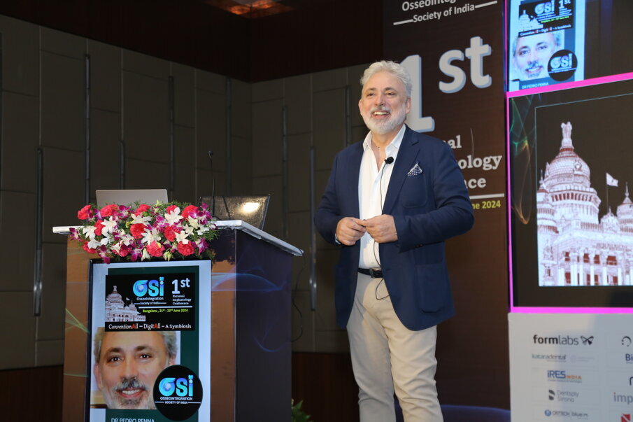 Fig 10: Dr Pedro Penna presenting on - Decision making in aesthetic area with dental implants