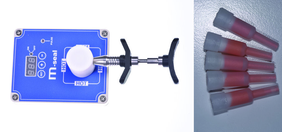 Fig. 7 - Riscaldatore M-seal con pistola su cui è inserita cartuccia contenete guttaperca da riscaldare.