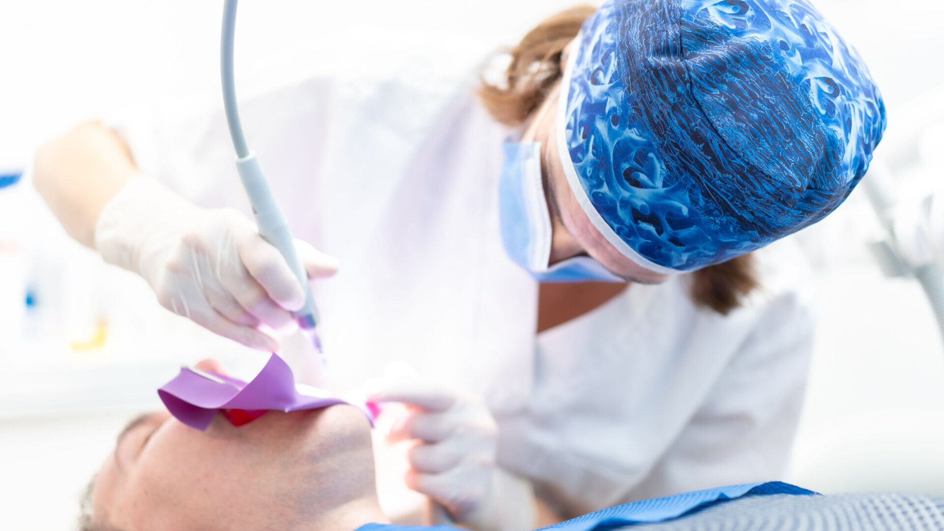 Laser-assisted irrigation in endodontic treatment of a tooth with obstructed canals—A case report