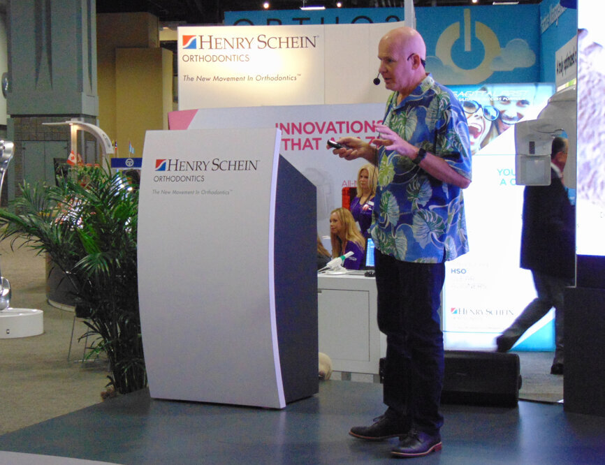 Dr. Dave Paquette offers a presentation on the digital ortho workflow at the Henry Schein Orthodontics booth.