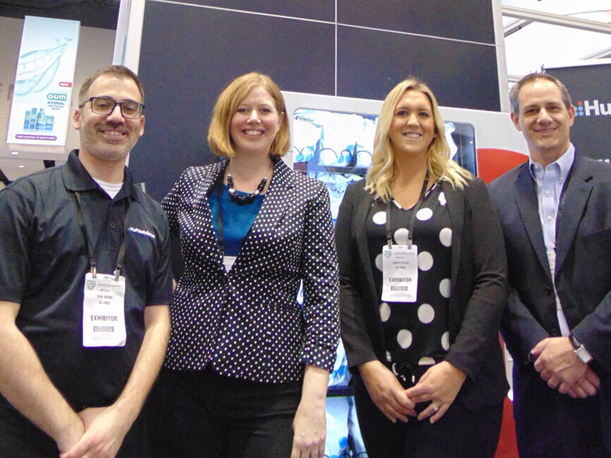 Hu Friedy Group is unveiling a new corporate identity at the Midwinter Meeting. From left: Ryan Bicking, Heather Kahl, Jennifer Tucker and Chris Sharpe. 