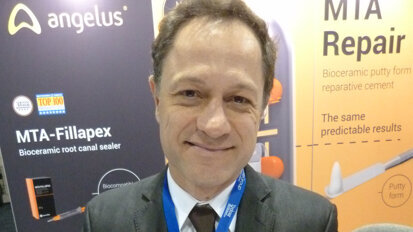 Marco Canonico in the Angelus booth, supplier of MTA Repair HP and MTA-Fillapex placement syringe.