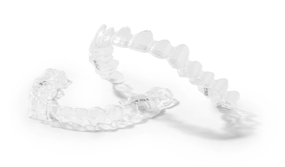 Fig. 2: SureSmile clear aligners are made with advanced technology and quality controls to ensure a precise fit, durability and a discreet appearance.