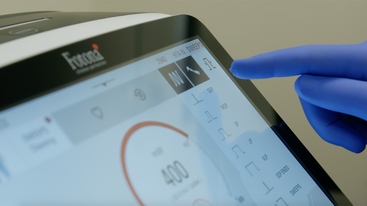 Root canal irrigation using a laser