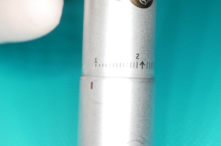 Fig. 2 - Ghiera con selettore di potenza presente alla base di un manipolo sonico ad aria.