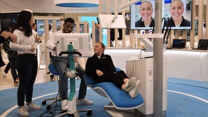 Treatment outcome simulation at the Align Technology booth.