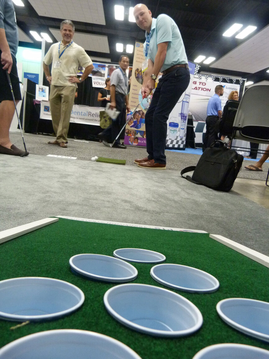 In the Professional Transition Strategies booth, you get three chances to sink one chip shot. (Photo: Robert Selleck/DTA)