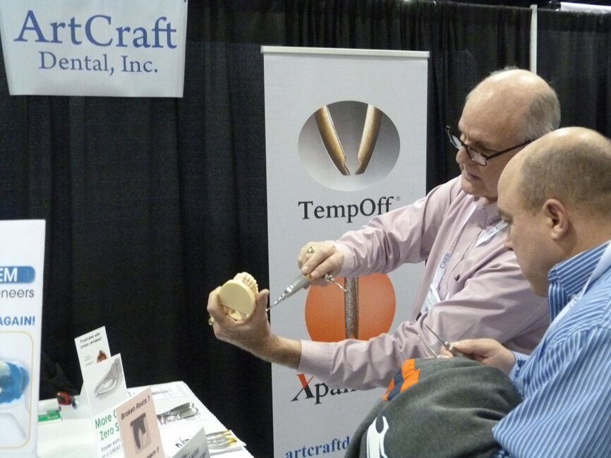 From left, specialized-handpiece inventor David Fyffe, the founder of ArtCraft Dental, demonstrates one of his expanders to Anthony Knowlton, DDS, of Eden Dental in Pueblo, Colo. (Photo: Robert Selleck/Dental Tribune America)