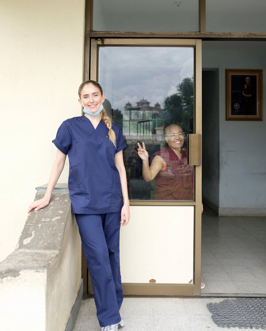 Dr Deborah Clement with a nurse translating from Tibetan. (Image: Melissa Dirsch)