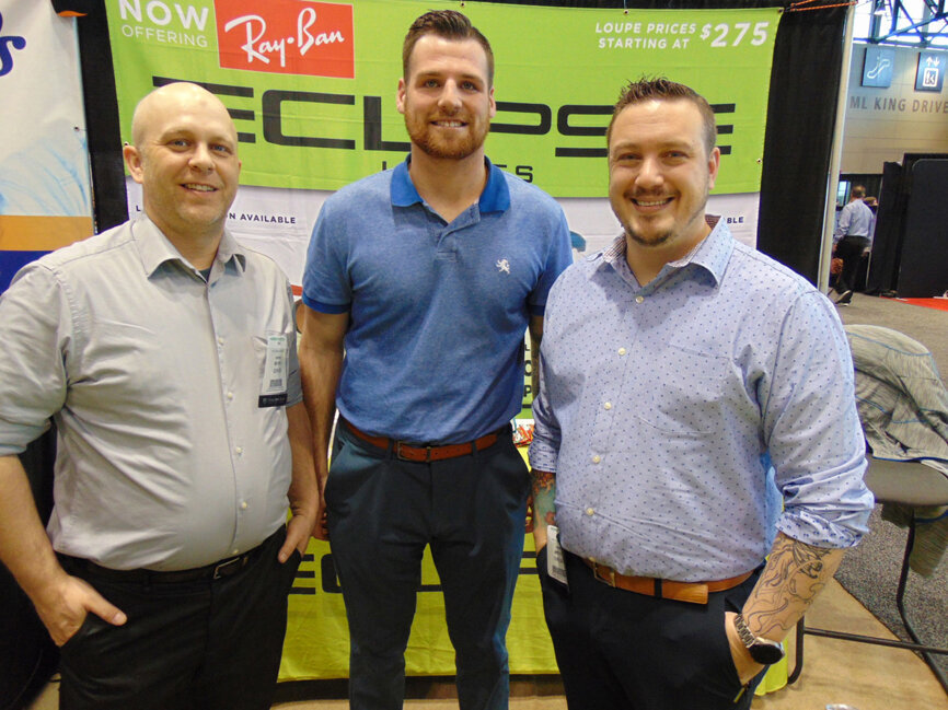 From left: Mike Newton, Charles Sobieraski and James Farleo of Eclipse Loupes. (Photo: Fred Michmershuizen/Dental Tribune America)