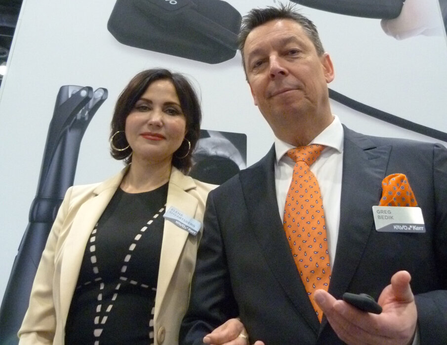 At the KaVo booth, Elena Shvartsberg, left, and Greg Bedik with the Dexis FS Ergo intraoral X-Ray sensor.