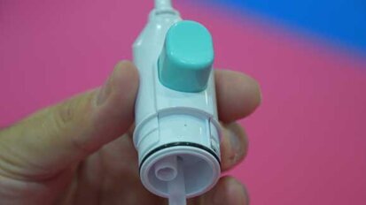 A hand-powered oral irrigator for everyone