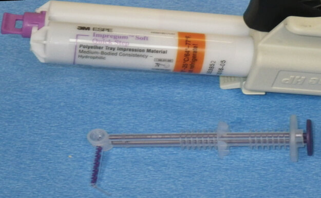 Fig. 6: A 3M™ Intra-oral Syringe is ready to be loaded with 3M™ Impregum™ Soft Polyether Impression Material.