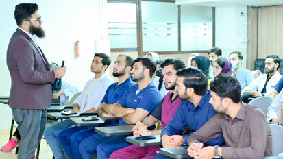 FJDC hosts lecture on research paper writing