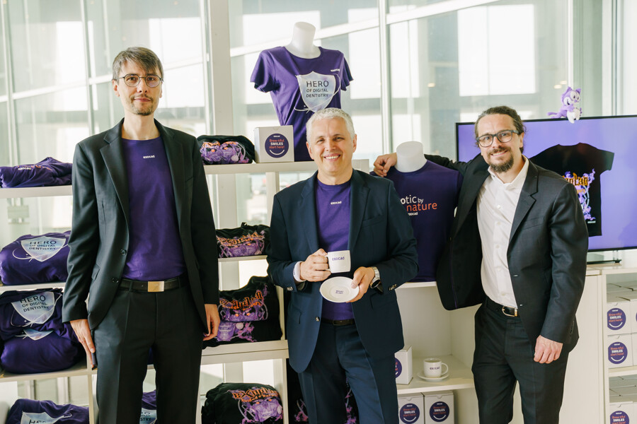 exocad management at the charity booth: Maik Gerth, CTO, Novica Savic, CCO and Tillmann Steinbrecher, CEO (from left to right).