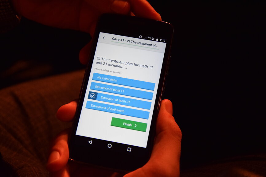 The EAO congress app allowed participants to answer questions at clinical sessions, for discussion by the experts on stage. (Photograph: Franziska Beier, DTI)