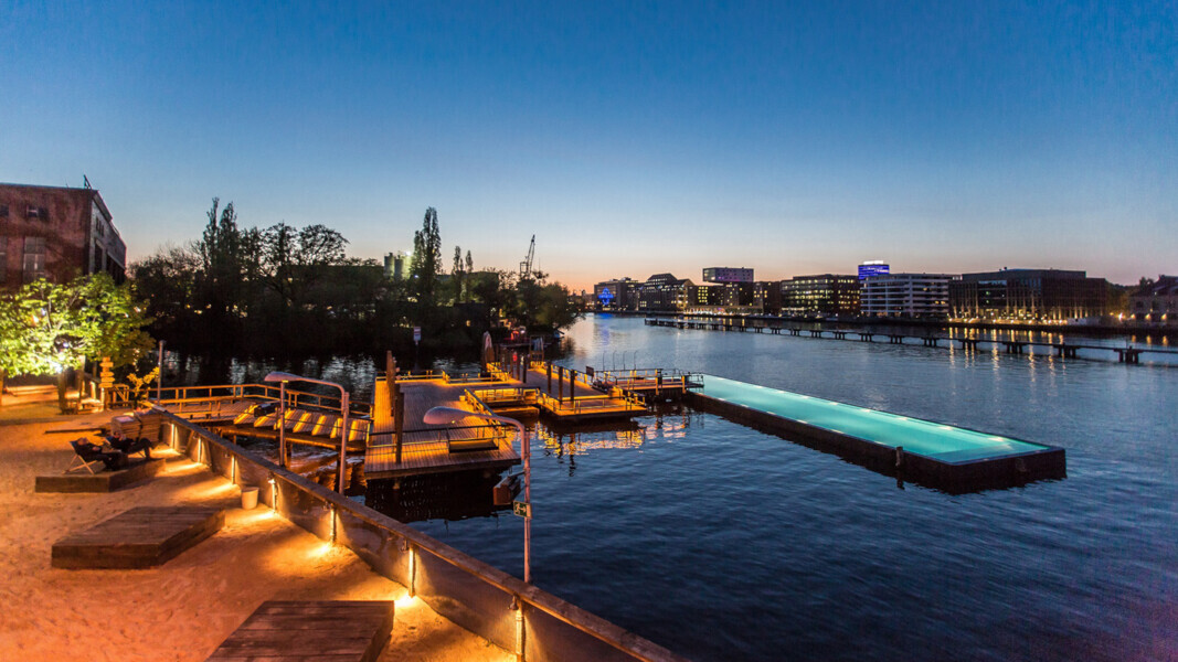 The Badeschiff is a picturesque floating public swimming pool area overlooking the Spree river.