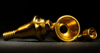 Screw-retained implant bridge with multi-unit abutment connection