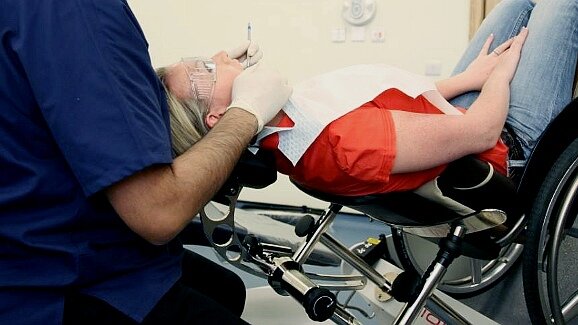 Dental chair simplifies treatment of physically handicapped