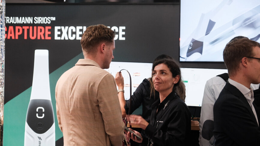 Congress attendees learn more about implant, regenerative and esthetic dentistry at the Straumann booth. 