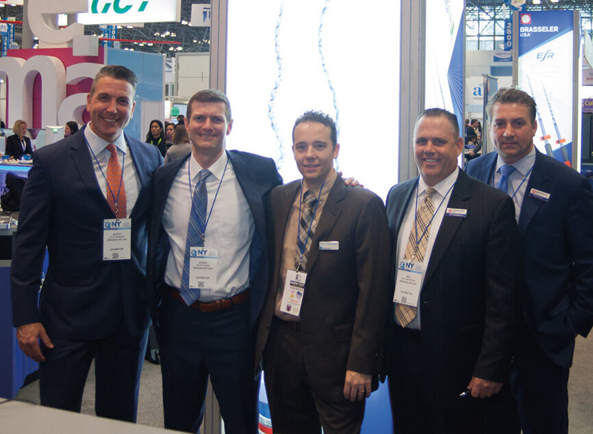 The reps from Brasseler. (Photo: Jahmel Charles, Dental Tribune America)