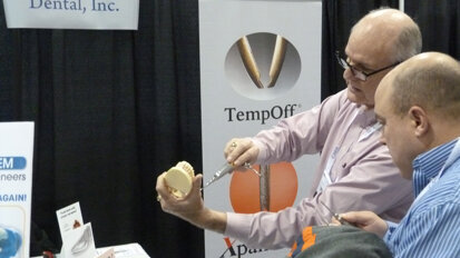 From left, specialized-handpiece inventor David Fyffe, the founder of ArtCraft Dental, demonstrates one of his expanders to Anthony Knowlton, DDS, of Eden Dental in Pueblo, Colo. (Photo: Robert Selleck/Dental Tribune America)
