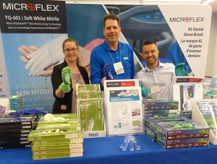 From left, Virginia Wilson, Scott Frail and D’Jimmy Beaumont in the Ansell booth.